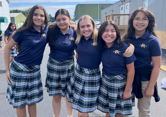 5th grade students standing together at recess