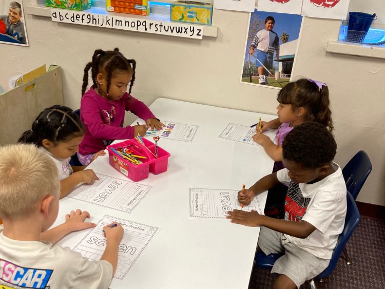 Five Children coloring pages around a table