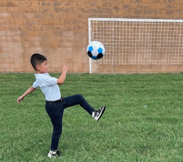 Soccer goal setup inside gymnasium