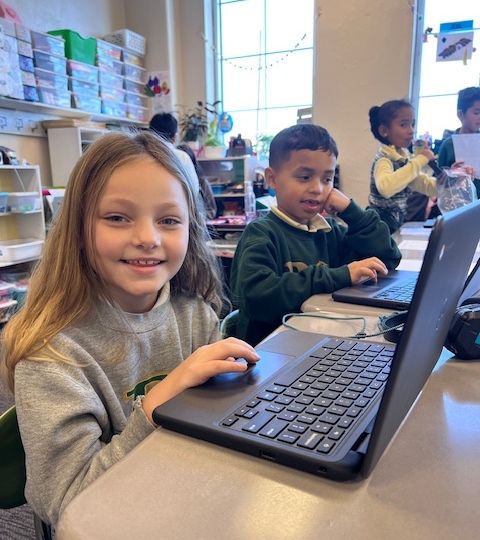 Students on their chromebook laptops