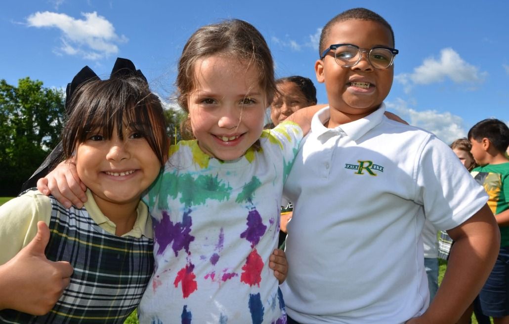 Three students at school event